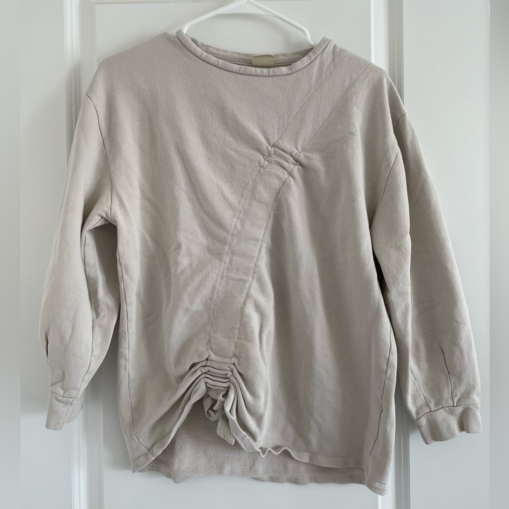 Cinch front sweater